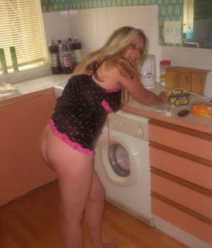 Drunk Blonde MILF Showing Her Ass In The Laundry