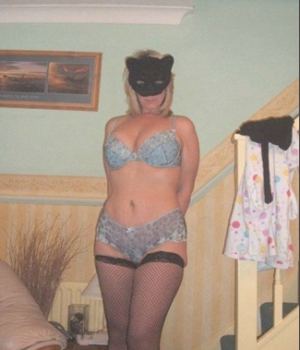 MILF in a cat mask and lingerie